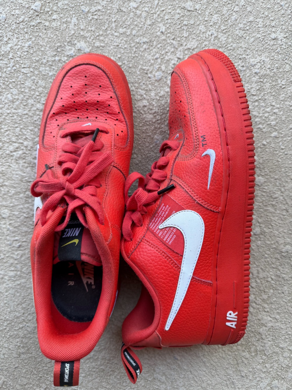 Nike Red Low-Top Sneakers with White Swoosh